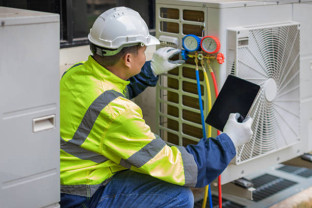 Professional Air Duct Cleaning technician working in Glenwood, GA